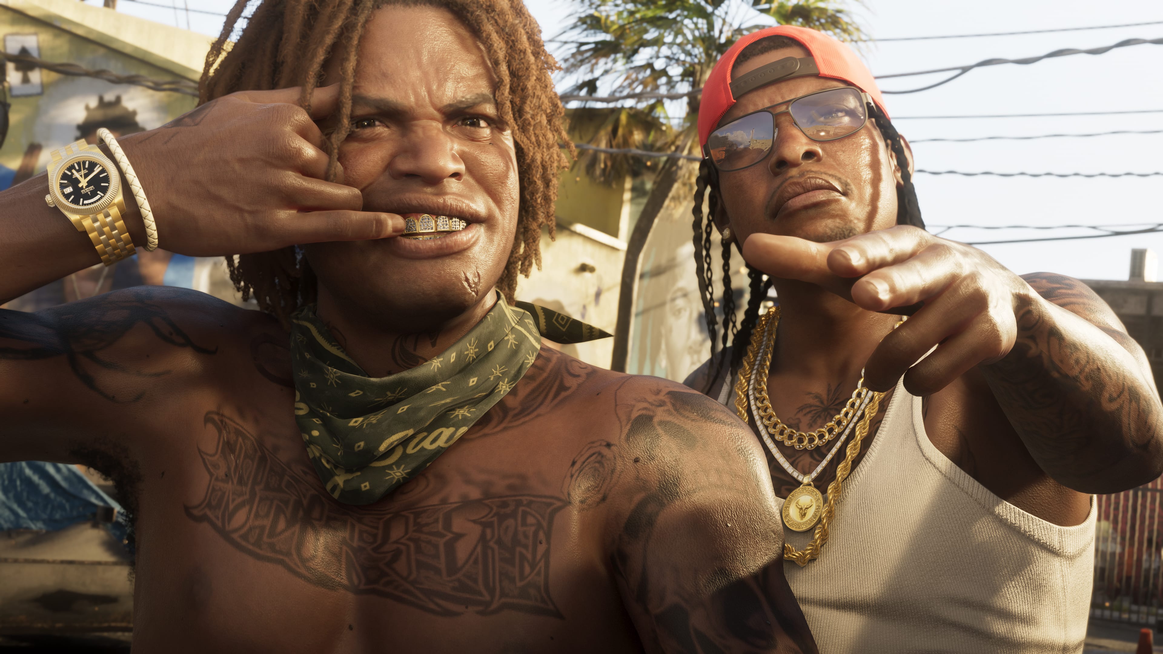Two friends with gold chains and grills posing for the camera on a sunny street